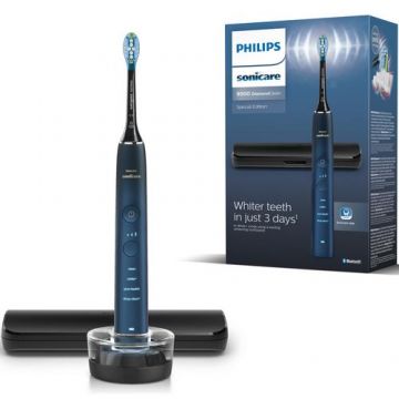 Periuta de dinti electrica Philips Sonicare DiamondClean 9000 HX9911/88, 62000 miscari/min, 4 moduri de curatare, 3 nivele intensitate, senzor presiune,functia BrushSync, aplicatie Sonicare, wireless Bluetooth, toc transport, baza de incarcare, Albastru